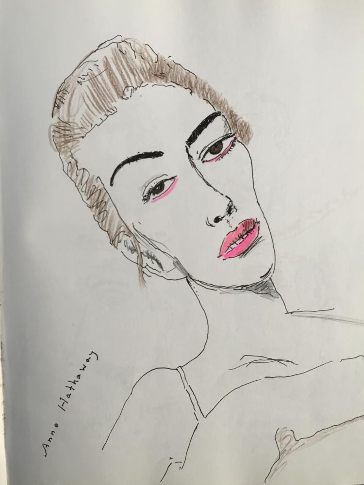 Drawing in notebook from photo in fashion magazine